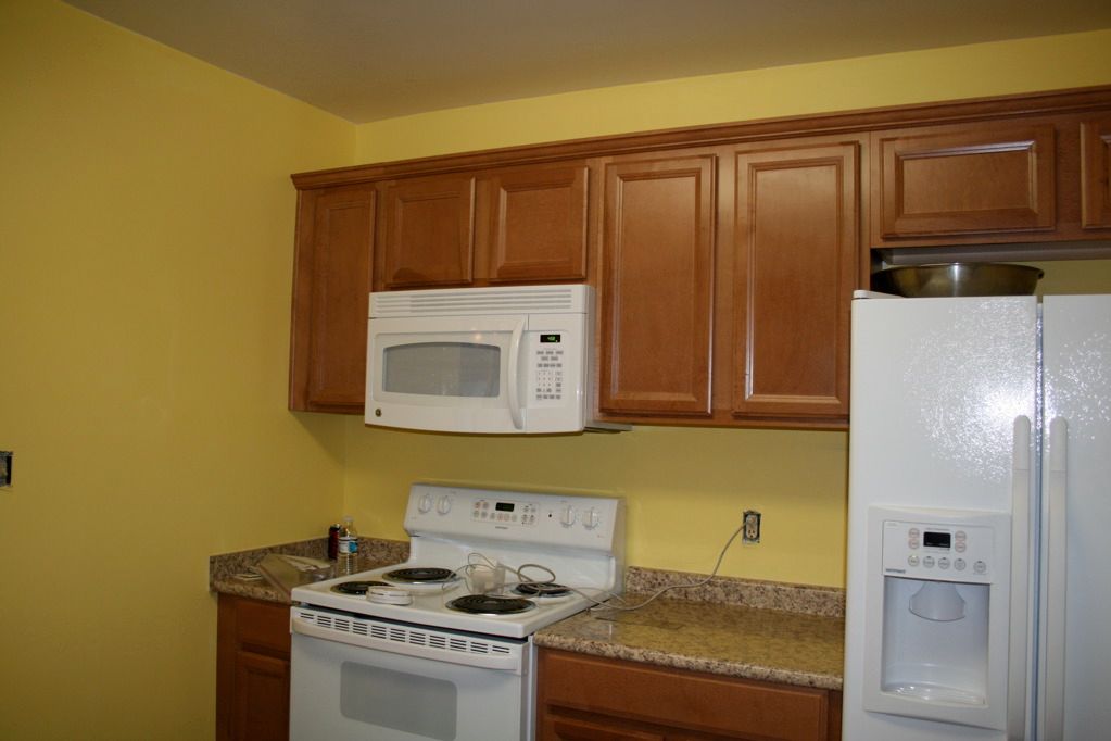 Kitchen After - Stove & Fridge