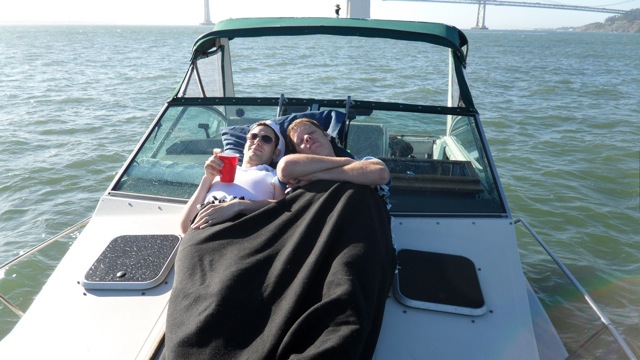 Rob and Eric lounging on the front of the boat