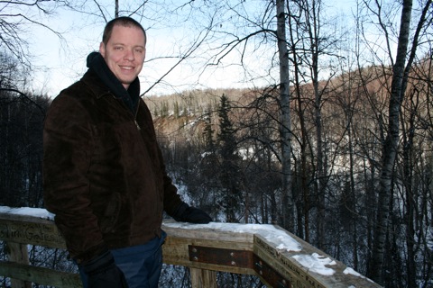 Rob standing on platform on hiking trail