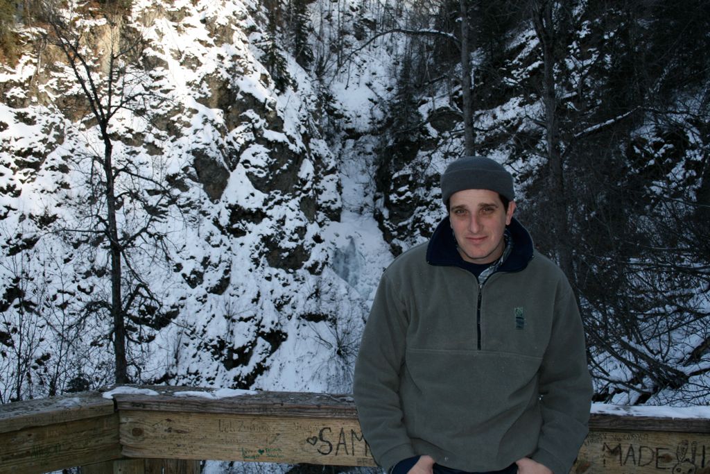 Myke standing on platform on hiking trail