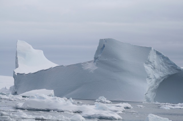 Enormous iceberg that likely has a bowl of water in the middle