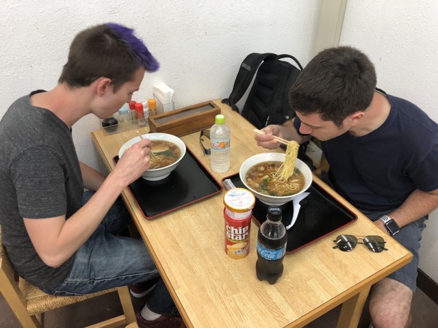 James and Jeremy enjoying noodles