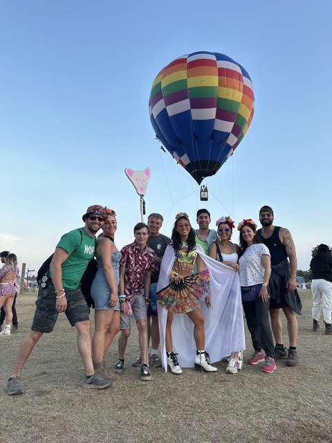 Our crew with a hot air balloon behind us