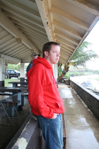 Rob trying to stay dry