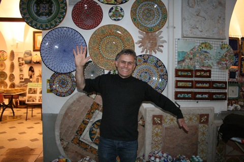 Pascal in front of his artwork