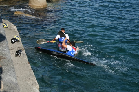 Guys playing a water polo-like game