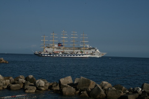 Size comparison of a cruise ship versus the sailboat