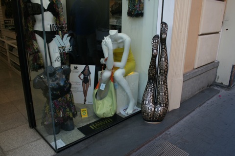 Weird fish-net stockings on a manequin outside a store