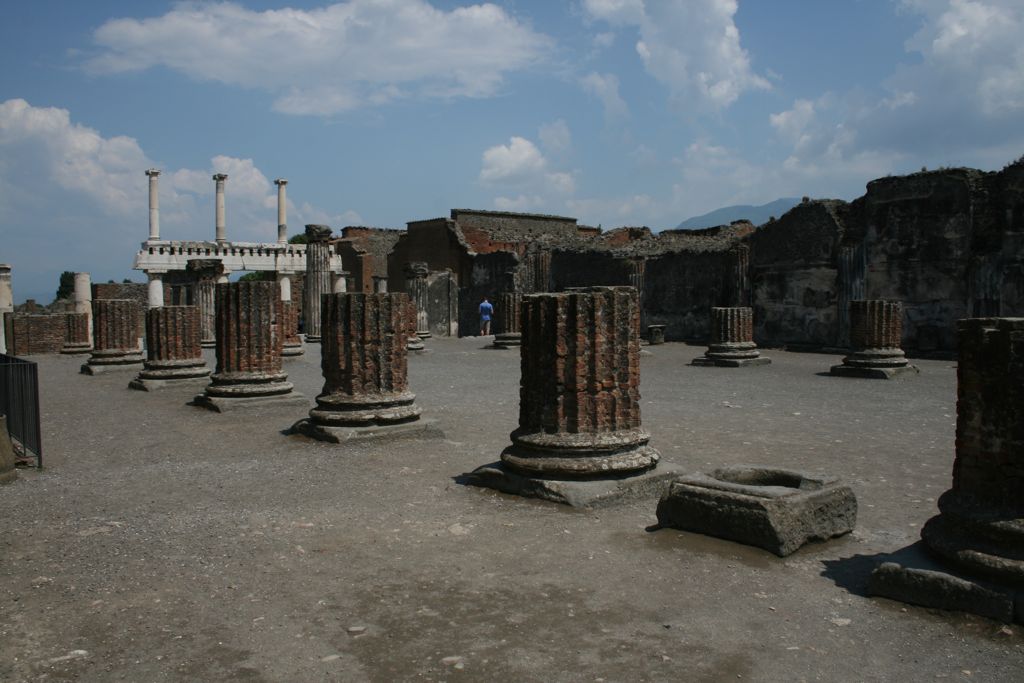 Basilica where business transactions and administration of justice took place (this word was later used to mean church)