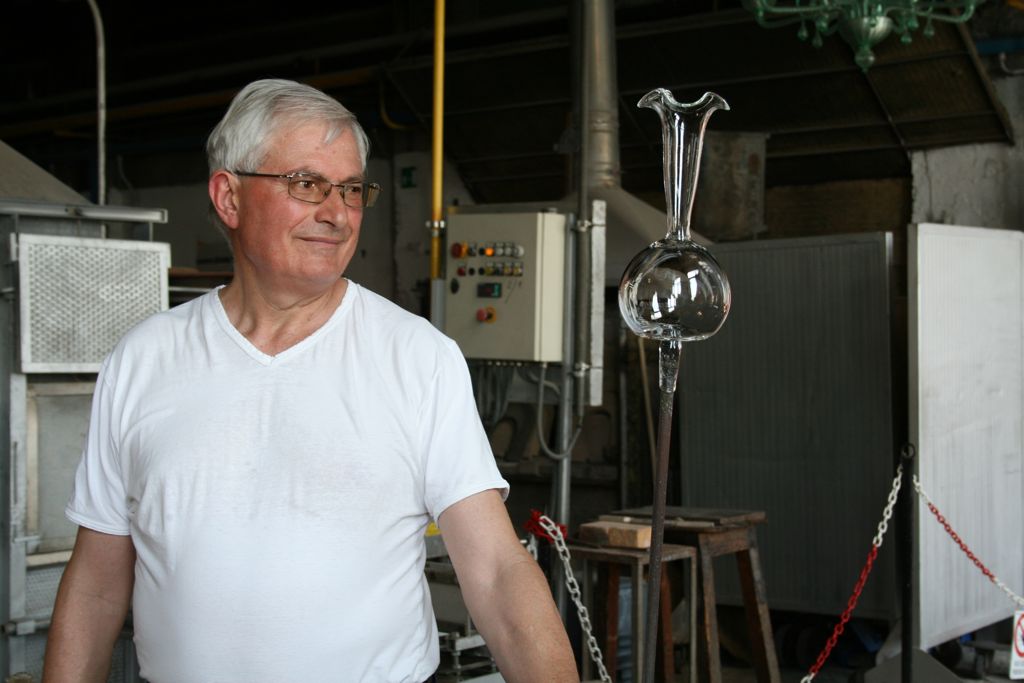 Glass Master, admiring his new vase