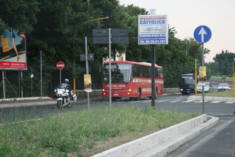 This must have been someone important... the police were closing off intersections to allow this bus through.