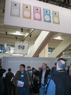 iPod mini banner and the stations at the front of the booth where I was working