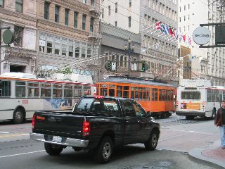 SF busses and trolley cars using the overhead power