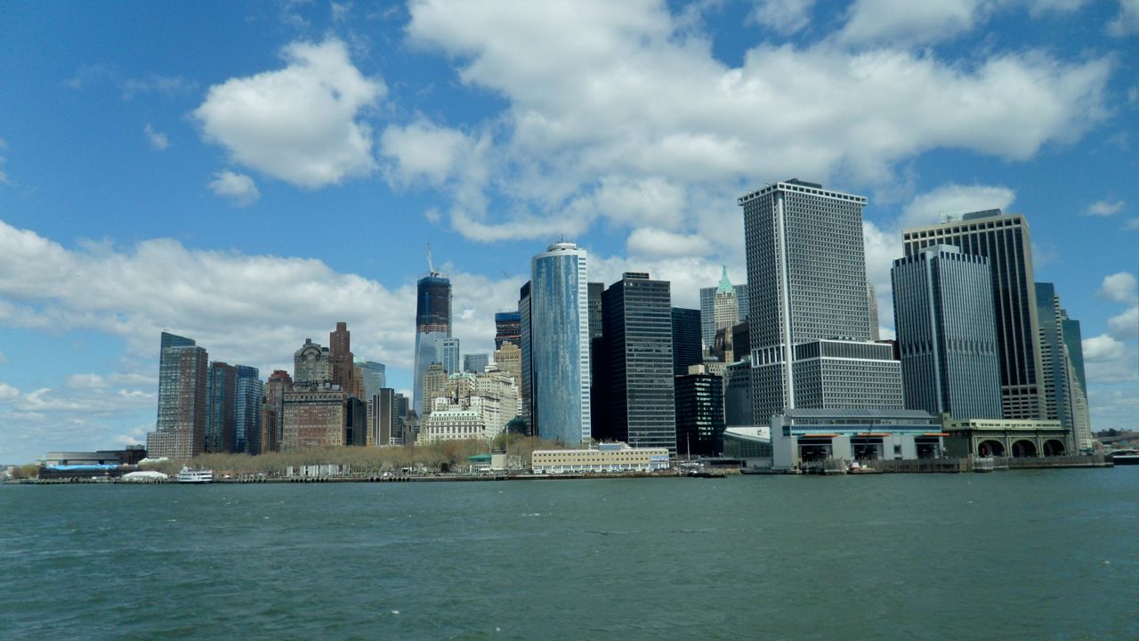 Lower Manhattan and Battery Park with the new WTC in the distance