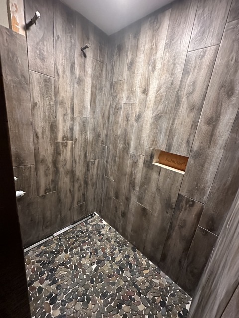 Tile floor in the shower too