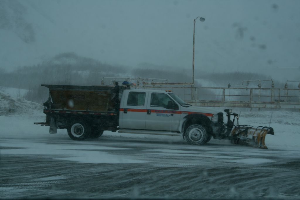 Snow plow clearing the tunnel approach area