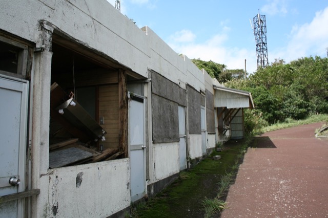 Abandoned shops as we start down the trail