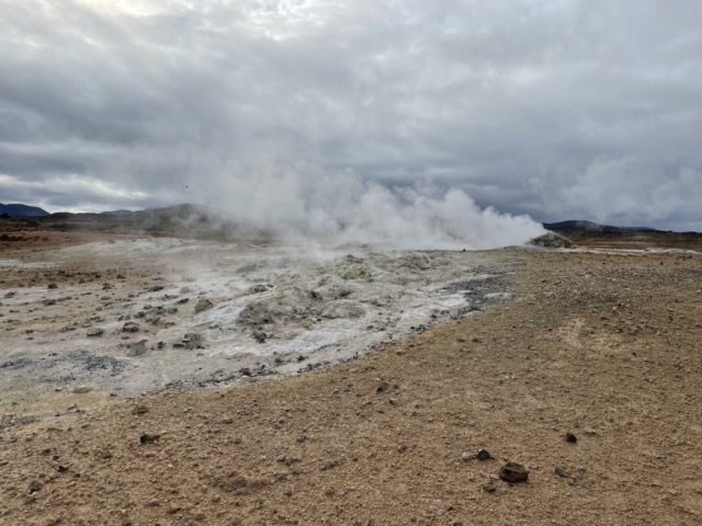 Steam rising out of a pile of rocks