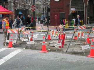 This poor lady was stuck, upside-down, in the wet cement and the construction guy didn't even care!